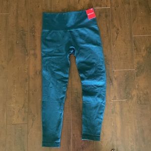Dark emerald Spanx. Ribbed seamless leggings. Size Medium. Perfect condition.